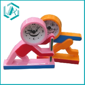 Wholesale New design lovely human shape electric alarm clock with selectable color and mode