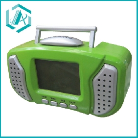 Wholesale radio shape in green with cute design well-selled electric alarm clock on sale