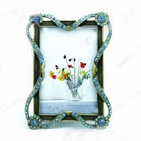 Wholesale hot selling alloy photo frame very beautiful and artistic home decor/gift