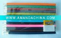 color pencil + sharpener barrel + ruler + eraser