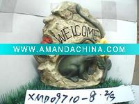 ceramic frog and stone