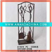 Metal fireplace tool holder
