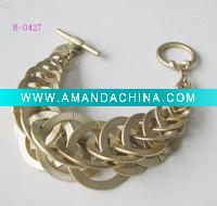 Wholesale 2011 modern fashion costume jewelry wide gold plated alloy braided bangle bracelets and bangles