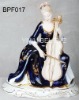 Porcelain arts and crafts of beauty playing violoncello